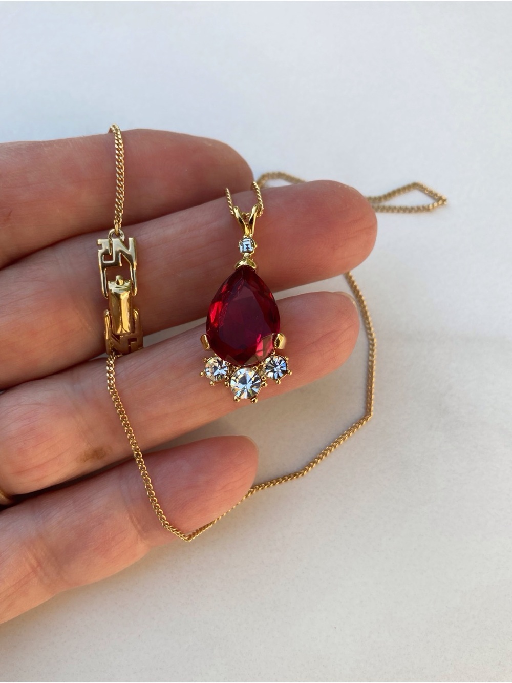 Stunning Nina Ricci Gold Pendant Necklace with Deep Red Teardrop Crystal